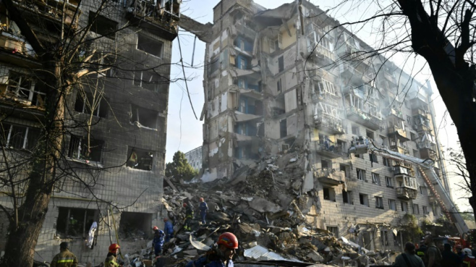 Russian strikes kill 10 in 'horrific' attack on Kyiv