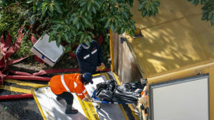 Incendie de Hong Kong: au moins 94 morts, l'angoissante recherche des disparus