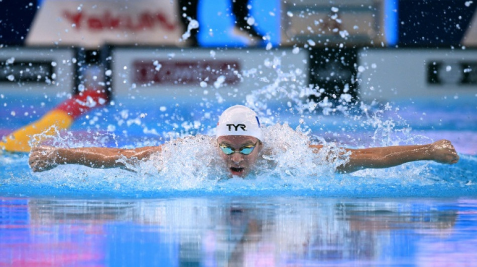 Marchand wins 200m medley gold, day after world record