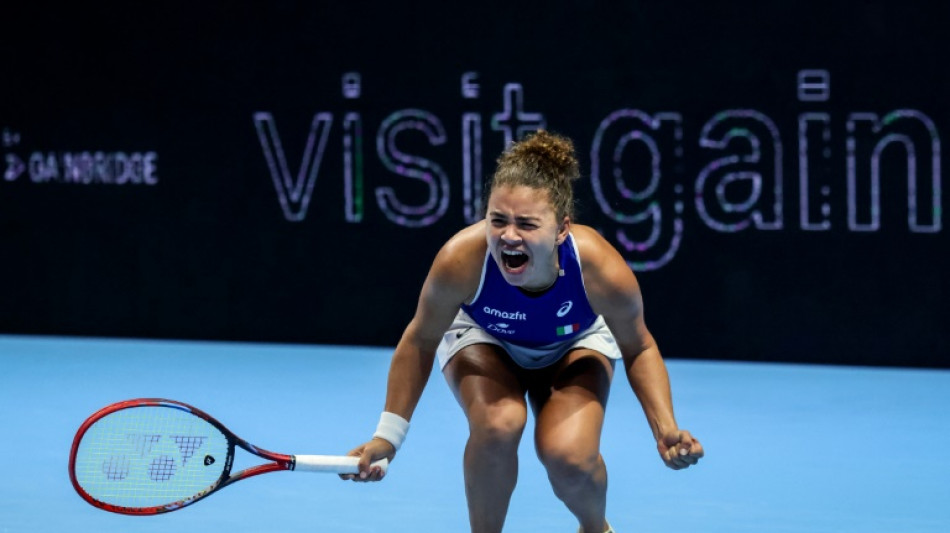 Hard-working Paolini prolongs Italy's BJK Cup title defence 