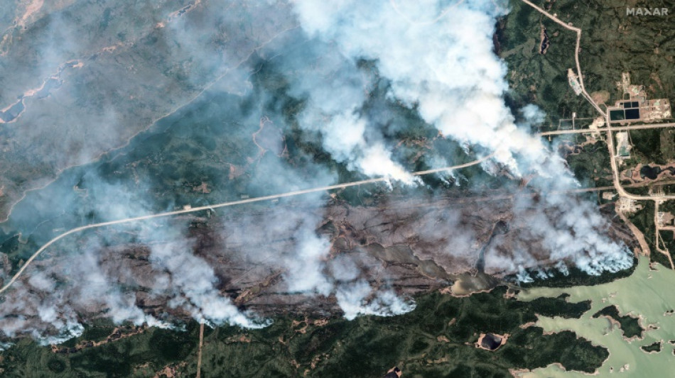 Military aids evacuations as Canada wildfires expand eastward