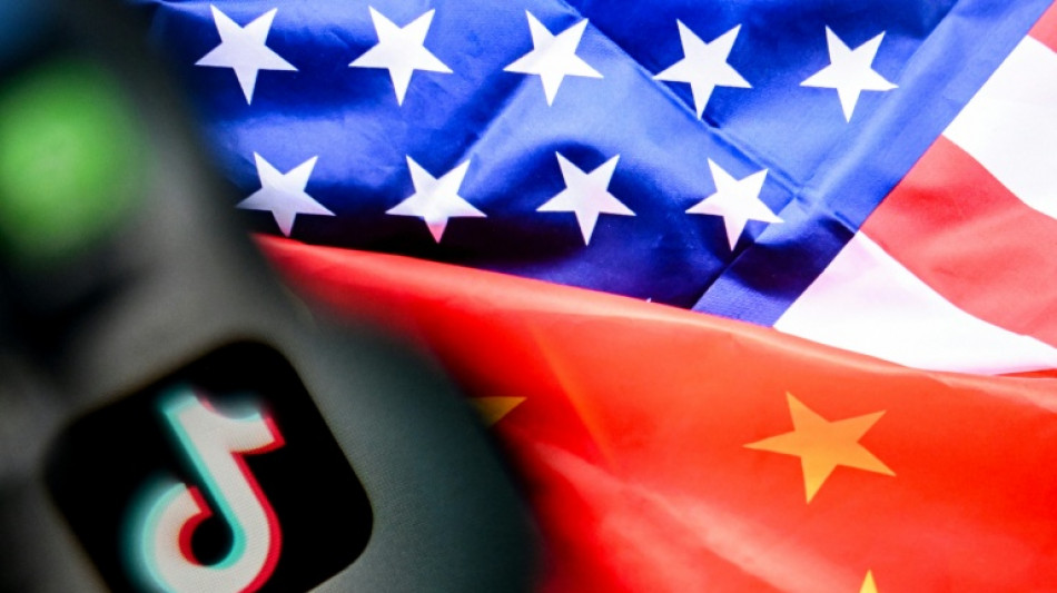 US stocks end at records again as Trump and Xi talk