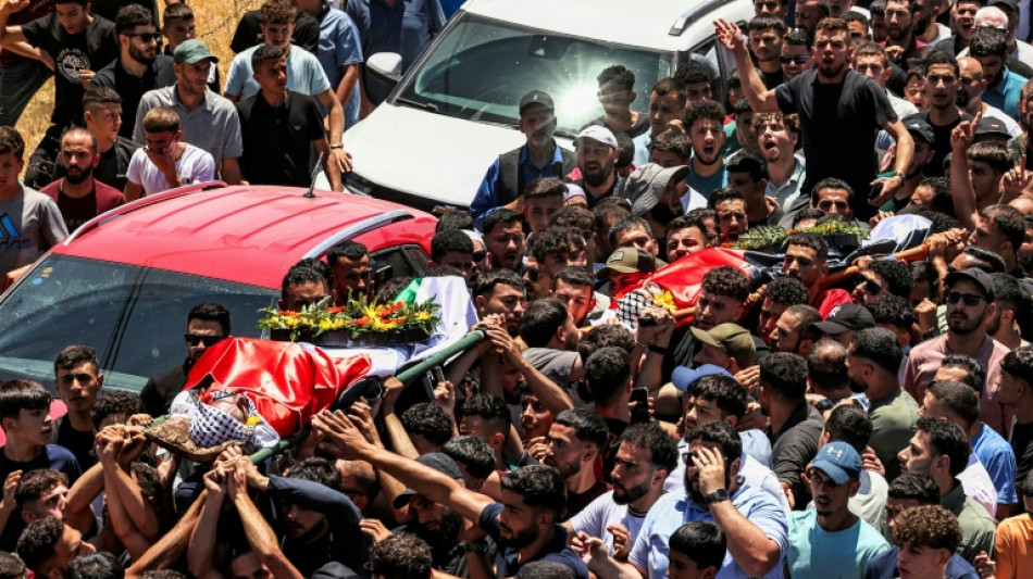 Anger in West Bank village at funeral of two young men