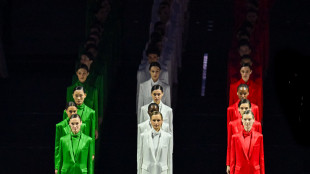 In vendita i tailleur pantalone rosso, bianco e verde di Armani per le Olimpiadi