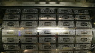 Asian markets fluctuate after Fed cuts interest rates