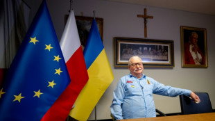 Trump either a 'traitor' or 'exceptional', Nobel-winner Walesa tells AFP