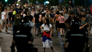 Serbian leader digs in, slams early elections rally