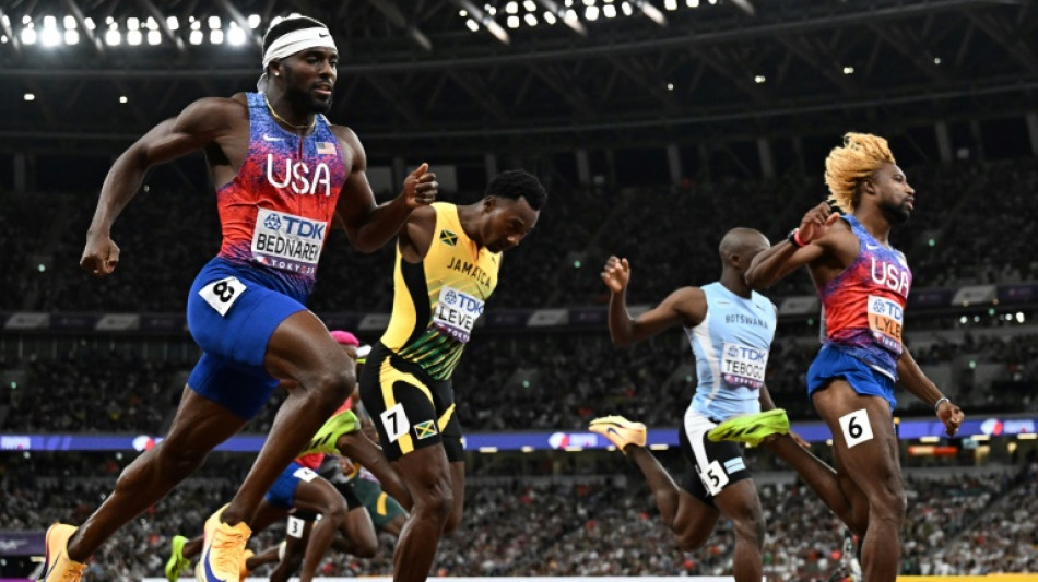 Roaring Lyles matches Bolt with fourth world 200m title