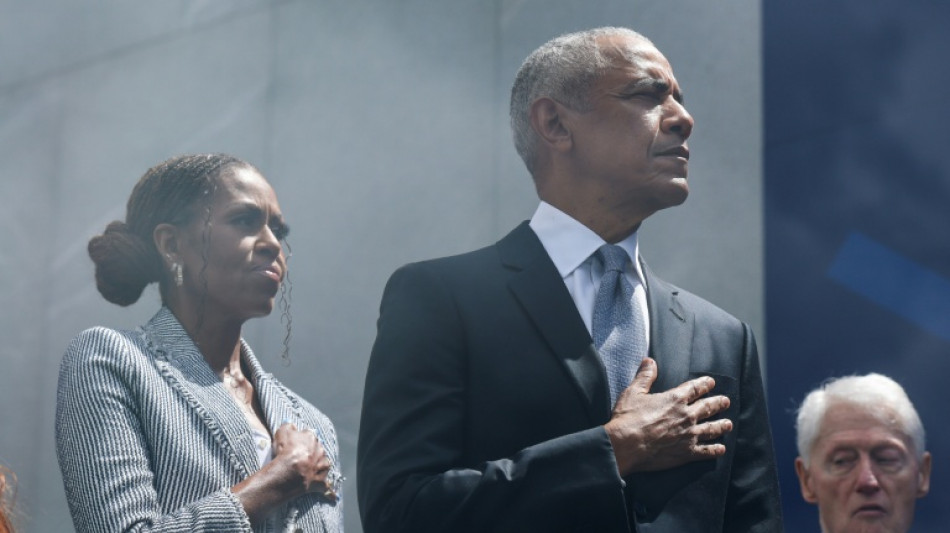 Ex-presidents, stars, but no Trump, turn out for Obama Center