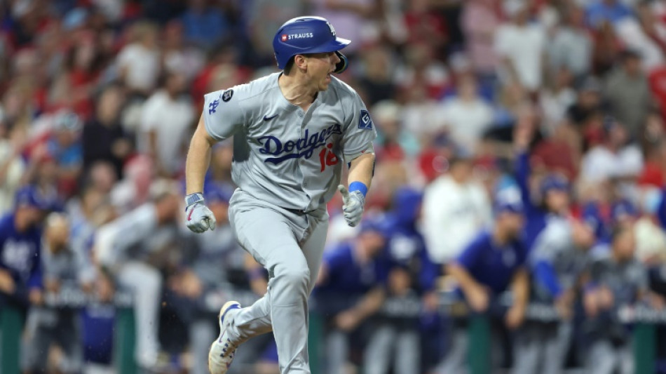 Dodgers hold off Phillies to win MLB playoff thriller