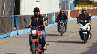 Iran's women bikers take the road despite legal, social obstacles