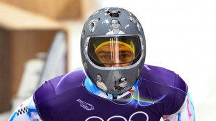 IOC to try to convince Ukrainian not to wear banned helmet
