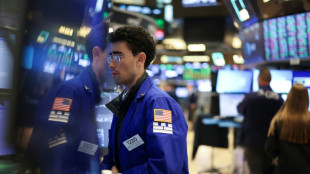 Wall Street termine en ordre dispersé, prudente avant les prix à la consommation